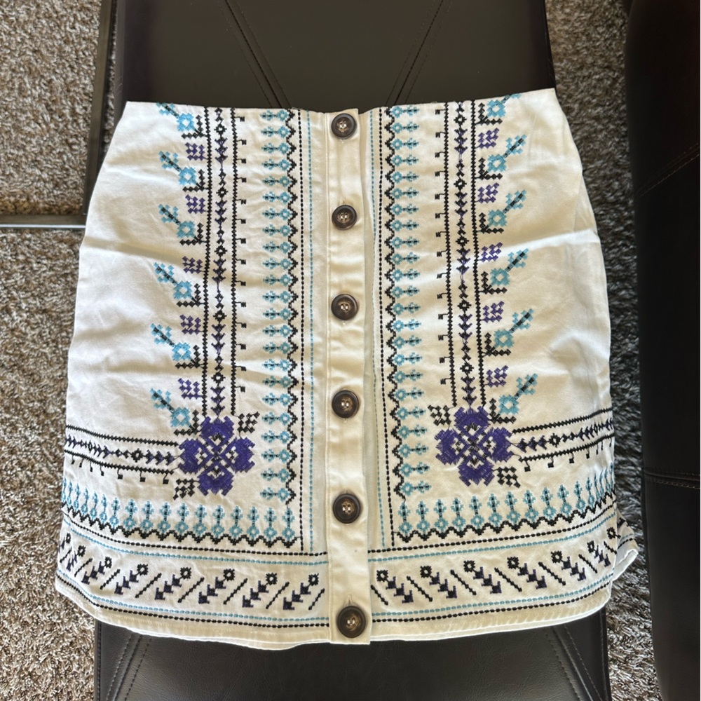 Blue Rain White Mini Skirt with Aqua, Purple, and black embroidery